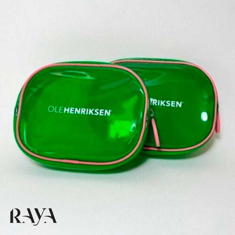 کیف لوازم آرایش سبز شفاف با زیپ صورتی اوله هنریکسن 